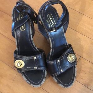 Coach Original brown and tan pattern platforms sandal with gold accents. Size 7